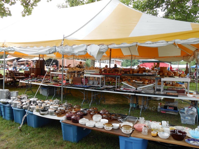 Vendors arrive early for the World's Longest Yard Sale.