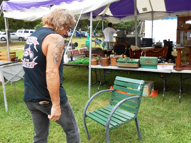 Jeff sees a chair he likes.