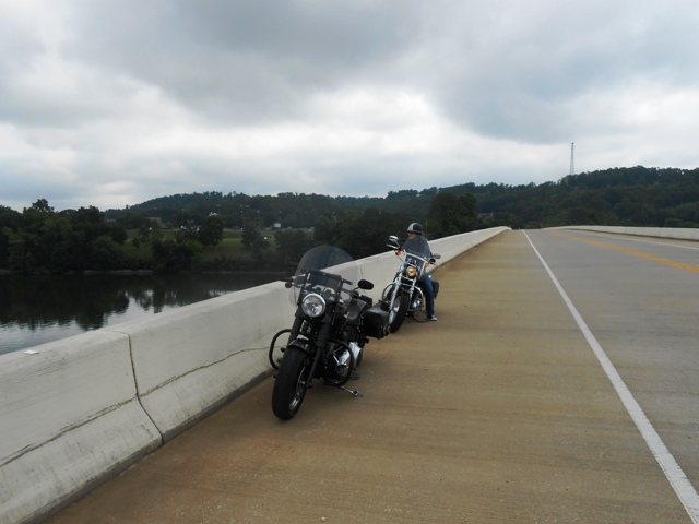 Pamo waits on the bridge while Jeff shoots photos.