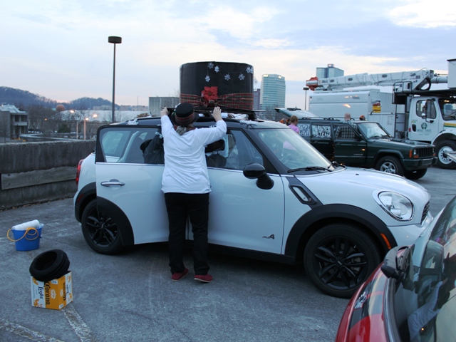 Donna decorates her Clubman with a snowman hat. Great job on the hat!