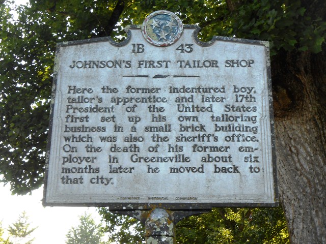 Placard tells the story about the tailor shop in Rutledge.