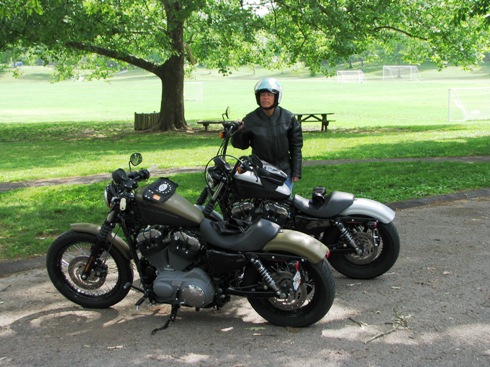 Pam by the bikes with the Norris park in the background.