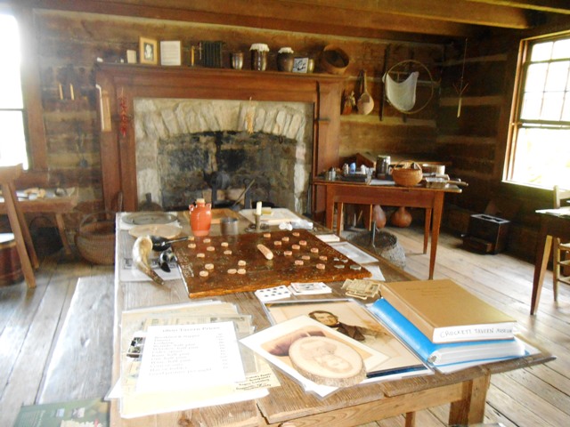 The checkers game inside the tavern.